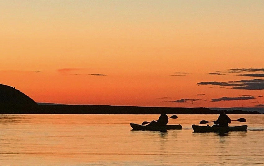 What are the origins of kayaking?